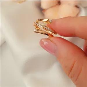 انگشتر زیبا و طلایی رنگ دو سر نگیندار ژوپینگ کد 3546