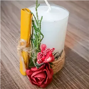 گیفت یلدایی با شمع و گل تزیینی