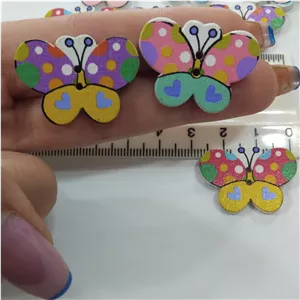 دکمه چوبی طرح پروانه  دکمه عروسکی 