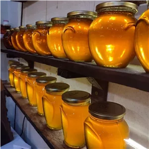 عسل طبیعی چندگل یک کیلویی ارسال رایگان خالص صاف شده بدون موم ارگانیک بدون واسطه از زنبوردار زنبورستان ماهور 