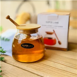 ظرف عسل شیشه ای امپرلند درب چوبی مدل ریوان