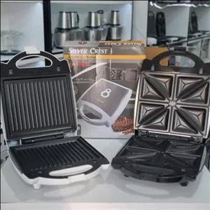 اسنکساز ( ساندویچ ساز ) 2 کاره \n برند معتبر سیلورکرست  قابلیت جدا شدن صفحات \n توان مصرفی 1600W \n سایز بزرگ ، 