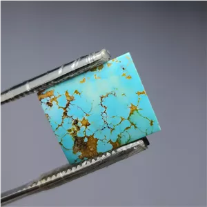 نگین فیروزه آبی آسمانی رگه طلایی نیشابوری